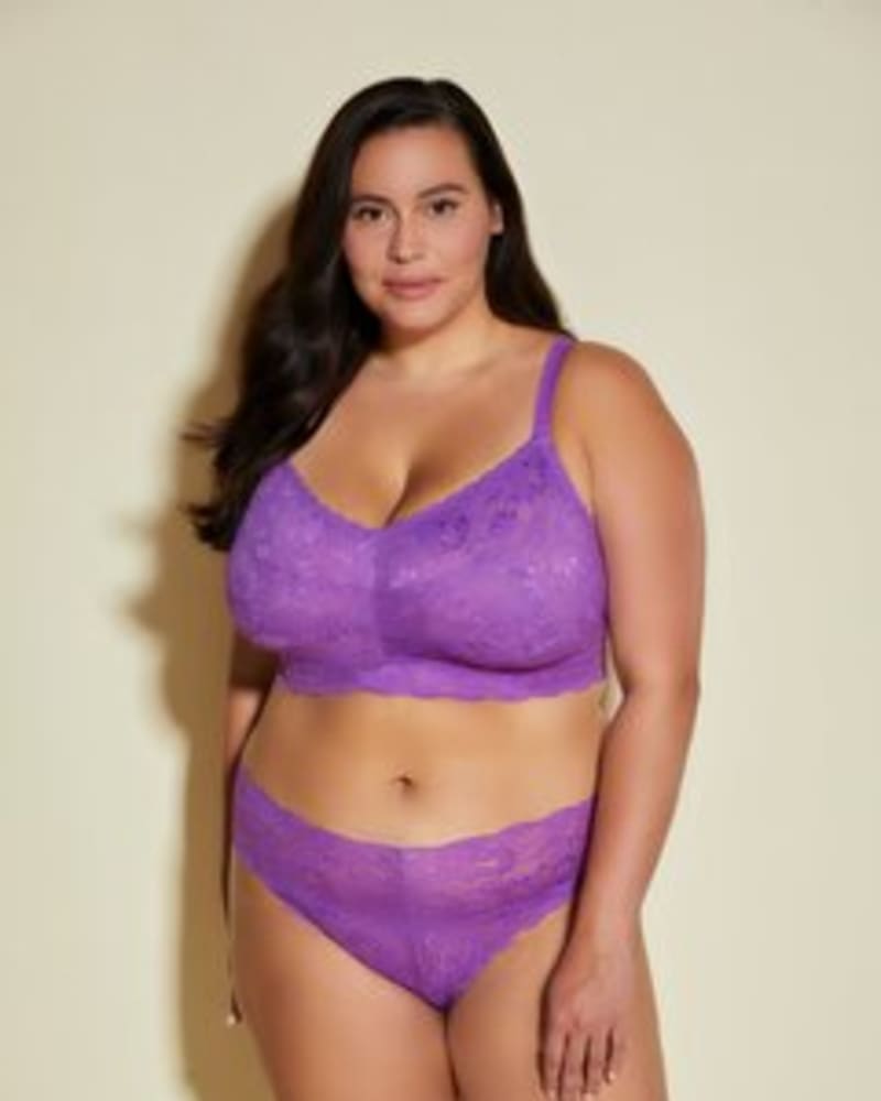 Front of a model wearing a size 1X Cutie Low Rise Thong in Cyclamen by Cosabella. | dia_product_style_image_id:253547